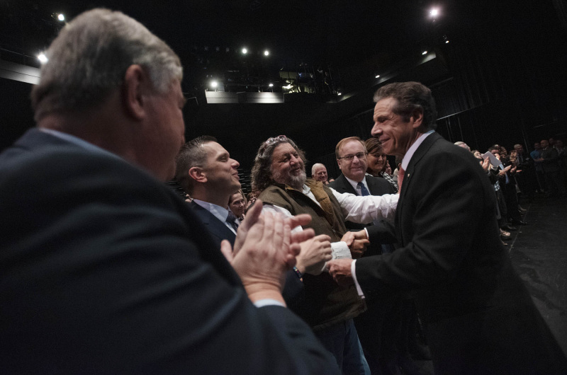 New York Governor Andrew Cuomo shakes hands with Proctors CEO Philip Morris after announcing the awarding of $10 million to Schenectady through the Downtown Revitalization Initiative (DRI) in the GE Theatre at Proctors Tuesday, November 5, 2019. Photo credit: Kate Penn - Proctors