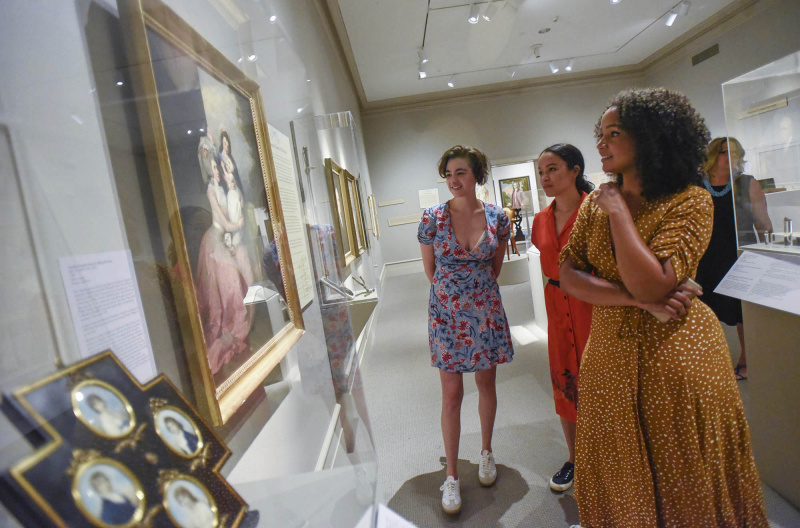 From left Hannah Cruz, Olivia Puckett and Stephanie Umoh look at a protrait of Angelica Schuyler with her children at the Albany Institute of History and Art in Albany Friday, August 16, 2019. Olivia Puckett plays Peggy Schuyler, Hannah Cruz plays Eliza Schuyler and Stephanie Umoh plays Angelica Schuyler in the touring production of Hamilton playing Proctors through August 25, 2019.